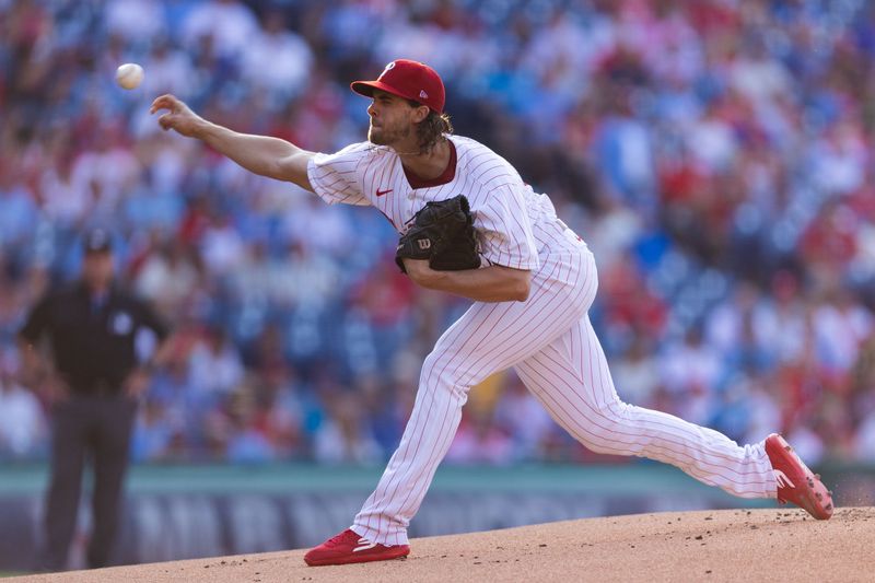 Jun 18, 2024; Philadelphia, Pennsylvania, USA; Philadelphia Phillies pitcher Aaron Nola (27) throws a pitch against the San Diego Padres during the first inning at Citizens Bank Park. Mandatory Credit: Bill Streicher-USA TODAY Sports