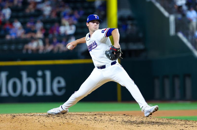 Apr 30, 2024; Arlington, Texas, USA;  Texas Rangers pitcher Cole Winn (60) throws during the ninth inning against the Washington Nationals against the Washington Nationals at Globe Life Field. Mandatory Credit: Kevin Jairaj-USA TODAY Sports