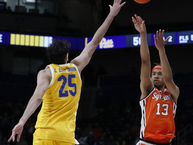 Jan 16, 2024; Pittsburgh, Pennsylvania, USA; Syracuse Orange forward Benny Williams (13) shoots against Pittsburgh Panthers forward Guillermo Diaz Graham (25) during the second half at the Petersen Events Center. Syracuse won 69-58. Mandatory Credit: Charles LeClaire-USA TODAY Sports