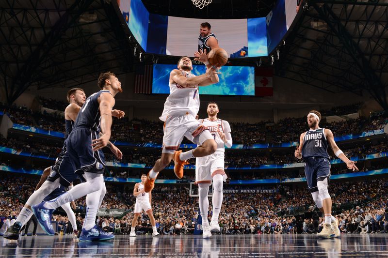 DALLAS, TX - NOVEMBER 8: Devin Booker #1 of the Phoenix Suns drives to the basket during the game against the Dallas Mavericks on November 6, 2024 at the American Airlines Center in Dallas, Texas. NOTE TO USER: User expressly acknowledges and agrees that, by downloading and or using this photograph, User is consenting to the terms and conditions of the Getty Images License Agreement. Mandatory Copyright Notice: Copyright 2024 NBAE (Photo by Glenn James/NBAE via Getty Images)