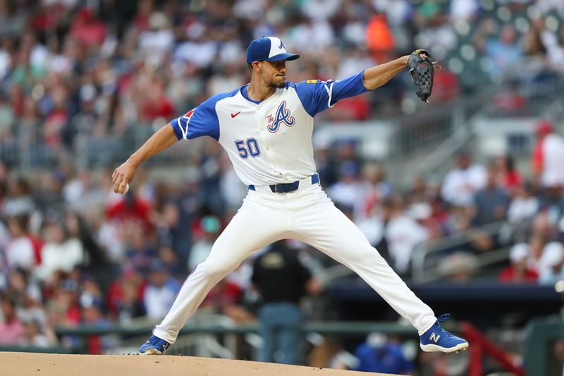 Apr 20, 2024; Cumberland, Georgia, USA; Atlanta Braves starting pitcher Charlie Morton (50) pitches in a game against the Texas Rangers in the first inning at Truist Park. Mandatory Credit: Mady Mertens-USA TODAY Sports