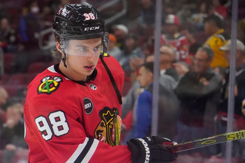 Oct 24, 2023; Chicago, Illinois, USA; Chicago Blackhawks center Connor Bedard (98) warms up before the game against the Boston Bruins at United Center. Mandatory Credit: David Banks-USA TODAY Sports