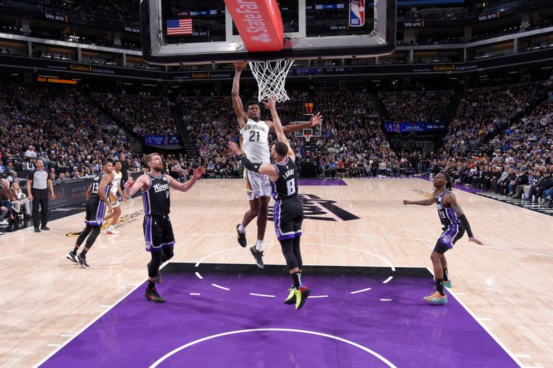 SACRAMENTO, CA - FEBRUARY 8:  Yves Missi #21 of the New Orleans Pelicans drives to the basket during the game against the Sacramento Kings on February 8, 2025 at Golden 1 Center in Sacramento, California. NOTE TO USER: User expressly acknowledges and agrees that, by downloading and or using this Photograph, user is consenting to the terms and conditions of the Getty Images License Agreement. Mandatory Copyright Notice: Copyright 2025 NBAE (Photo by Rocky Widner/NBAE via Getty Images)