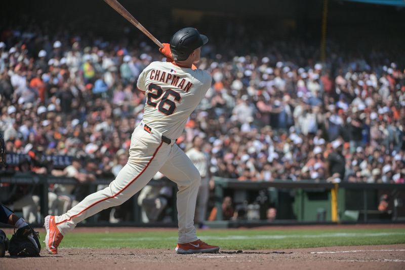 Jun 7, 2025; San Francisco, California, USA;  San Francisco Giants third baseman Matt Chapman (26) hits a walk off home run against the Atlanta Braves during the ninth inning at Oracle Park. Mandatory Credit: Ed Szczepanski-Imagn Images