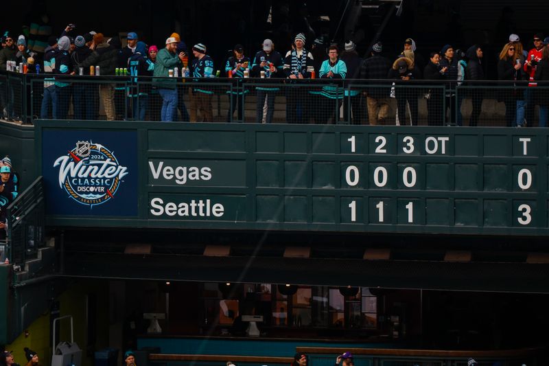 Jan 1, 2024; Seattle, Washington, USA; Fans cheer following a 3-0 victory by the Seattle Kraken against the Vegas Golden Knights in the 2024 Winter Classic ice hockey game at T-Mobile Park. Mandatory Credit: Joe Nicholson-USA TODAY Sports