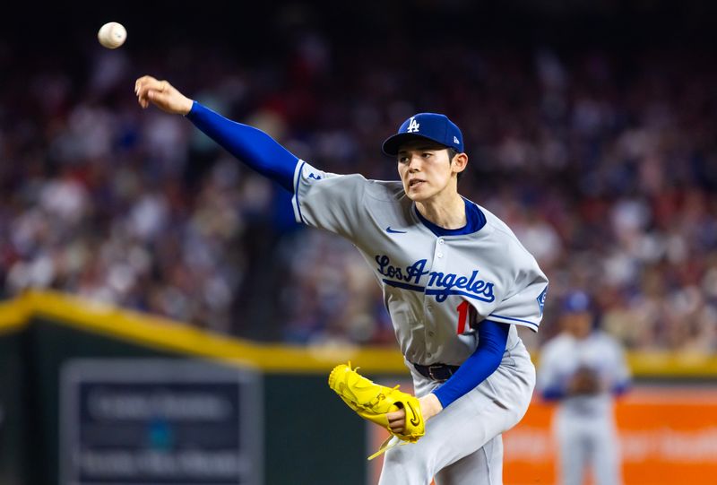 May 9, 2025; Phoenix, Arizona, USA; Los Angeles Dodgers pitcher Roki Sasaki against the Arizona Diamondbacks at Chase Field. Mandatory Credit: Mark J. Rebilas-Imagn Images
