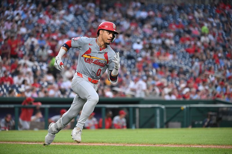 Jul 5, 2024; Washington, District of Columbia, USA; St. Louis Cardinals shortstop Masyn Winn (0) sprints to first base against the Washington Nationals during the fifth inning at Nationals Park. Mandatory Credit: Rafael Suanes-USA TODAY Sports