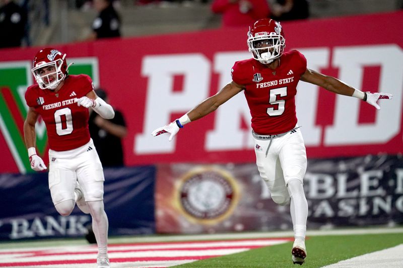 Sep 30, 2023; Fresno, California, USA; Fresno State Bulldogs wide receiver Jaelen Gill (5) reacts after catching a pass for a touchdown against the Nevada Wolf Pack in the first quarter at Valley Children's Stadium. Mandatory Credit: Cary Edmondson-USA TODAY Sports