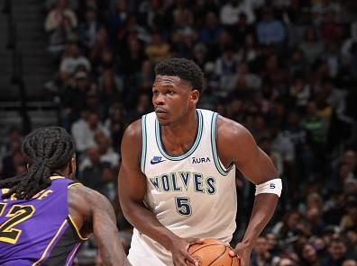 MINNEAPOLIS, MN -  DECEMBER 30: Anthony Edwards #5 of the Minnesota Timberwolves looks on during the game against the Los Angeles Lakers on December 30, 2023 at Target Center in Minneapolis, Minnesota. NOTE TO USER: User expressly acknowledges and agrees that, by downloading and or using this Photograph, user is consenting to the terms and conditions of the Getty Images License Agreement. Mandatory Copyright Notice: Copyright 2023 NBAE (Photo by David Sherman/NBAE via Getty Images)