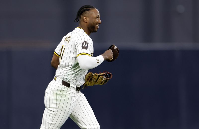 Oct 9, 2024; San Diego, California, USA; San Diego Padres outfielder Jurickson Profar (10) reacts after making a catch in the first inning against the Los Angeles Dodgers during game four of the NLDS for the 2024 MLB Playoffs at Petco Park. Mandatory Credit: David Frerker-Imagn Images