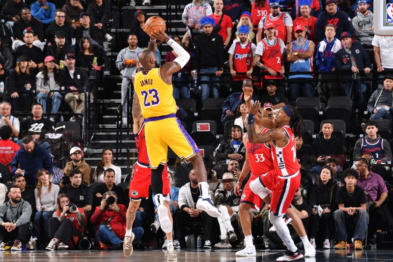 INGLEWOOD, CA - FEBRUARY 4: LeBron James #23 of the Los Angeles Lakers shoots the ball during the game against the LA Clippers on February 4, 2025 at Intuit Dome in Los Angeles, California. NOTE TO USER: User expressly acknowledges and agrees that, by downloading and/or using this Photograph, user is consenting to the terms and conditions of the Getty Images License Agreement. Mandatory Copyright Notice: Copyright 2025 NBAE (Photo by Juan Ocampo/NBAE via Getty Images)