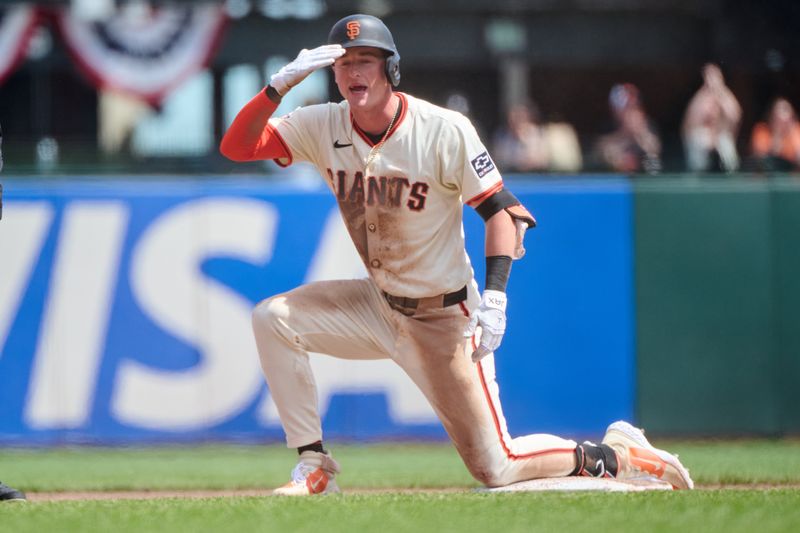 Apr 10, 2024; San Francisco, California, USA; San Francisco Giants shortstop Tyler Fitzgerald (49) salutes the home dugout after hitting a double against the Washington Nationals during the fifth inning at Oracle Park. Mandatory Credit: Robert Edwards-USA TODAY Sports