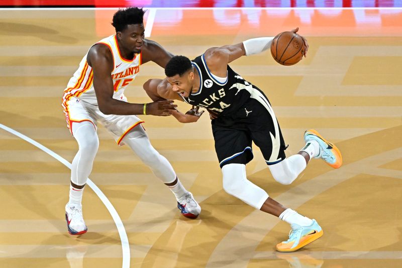 LAS VEGAS, NV - DECEMBER 14: Giannis Antetokounmpo #34 of the Milwaukee Bucks handles the ball during the game against the Atlanta Hawks during the Emirates NBA Cup Semifinal game on December 14, 2024 at T-Mobile Arena in Las Vegas, Nevada. NOTE TO USER: User expressly acknowledges and agrees that, by downloading and/or using this Photograph, user is consenting to the terms and conditions of the Getty Images License Agreement. Mandatory Copyright Notice: Copyright 2024 NBAE (Photo by David Becker/NBAE via Getty Images)