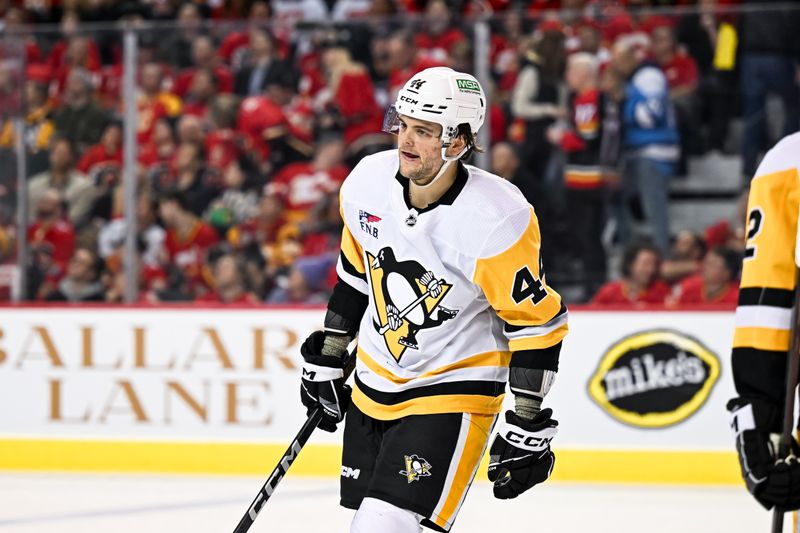 Mar 2, 2024; Calgary, Alberta, CAN; Pittsburgh Penguins center Jonathan Gruden (44) celebrates a goal against the Calgary Flames during the first period at Scotiabank Saddledome. Mandatory Credit: Brett Holmes-USA TODAY Sports