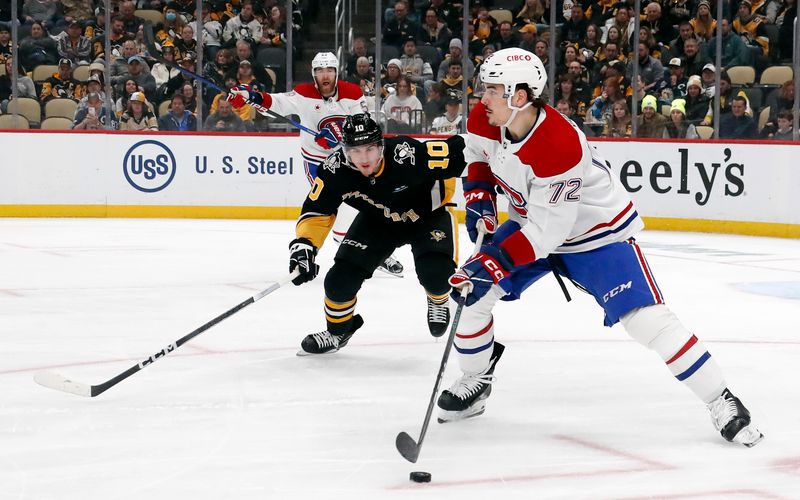 Feb 22, 2024; Pittsburgh, Pennsylvania, USA; Montreal Canadiens defenseman Arber Xhekaj (72) handles the puck ahead of Pittsburgh Penguins left wing Drew O'Connor (10) during the first period at PPG Paints Arena. Mandatory Credit: Charles LeClaire-USA TODAY Sports