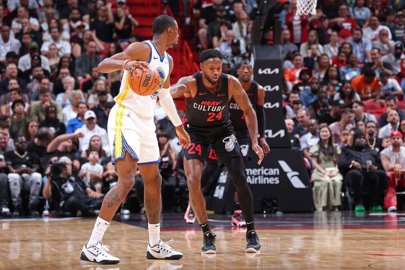 MIAMI, FL - MARCH 26: Haywood Highsmith #24 of the Miami Heat plays defense during the game against the Golden State Warriors on March 26, 2024 at Kaseya Center in Miami, Florida. NOTE TO USER: User expressly acknowledges and agrees that, by downloading and or using this Photograph, user is consenting to the terms and conditions of the Getty Images License Agreement. Mandatory Copyright Notice: Copyright 2024 NBAE (Photo by Jeff Haynes/NBAE via Getty Images)