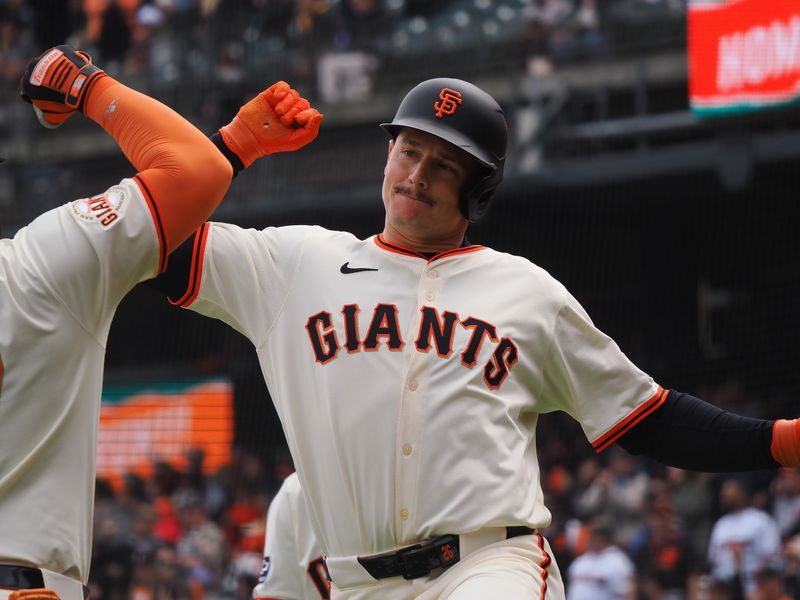 Apr 24, 2025; San Francisco, California, USA; San Francisco Giants third baseman Matt Chapman (26) celebrates with a teammate after hitting a two-run home run against the Milwaukee Brewers during the fifth inning at Oracle Park. Mandatory Credit: Kelley L Cox-Imagn Images