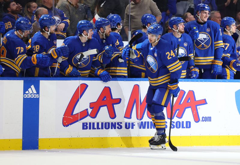 Apr 11, 2024; Buffalo, New York, USA;  Buffalo Sabres center Dylan Cozens (24) celebrates his goal with teammates during the third period against the Washington Capitals at KeyBank Center. Mandatory Credit: Timothy T. Ludwig-USA TODAY Sports