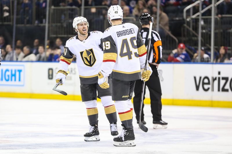 Jan 26, 2024; New York, New York, USA; Vegas Golden Knights right wing Jonathan Marchessault (81) celebrates with center Ivan Barbashev (49) after scoring a goal in the second period against the New York Rangers at Madison Square Garden. Mandatory Credit: Wendell Cruz-USA TODAY Sports