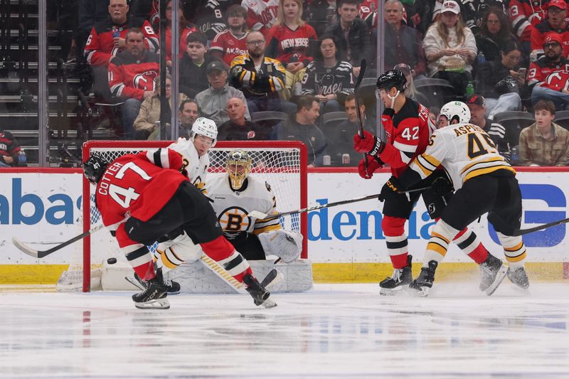 Mar 16, 2026; Newark, New Jersey, USA; New Jersey Devils left wing Paul Cotter (47) scores a goal against the Boston Bruins during the third period at Prudential Center. Mandatory Credit: Ed Mulholland-Imagn Images