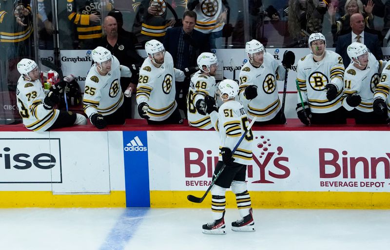 Oct 24, 2023; Chicago, Illinois, USA; Boston Bruins center Matthew Poitras (51) celebrates his goal against the Chicago Blackhawks during the third period at United Center. Mandatory Credit: David Banks-USA TODAY Sports