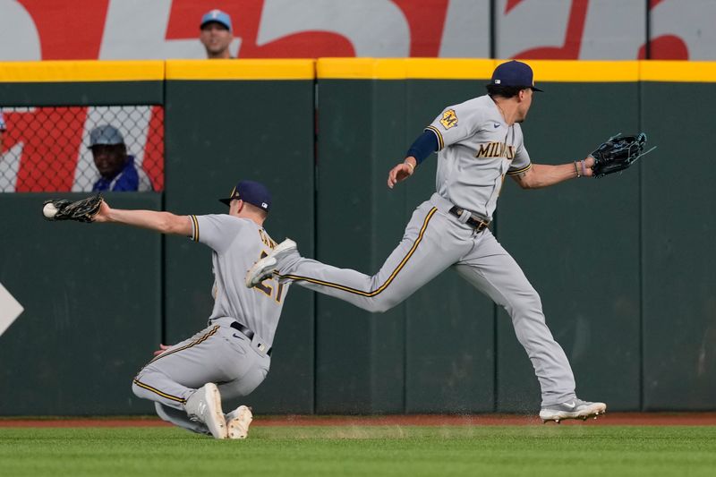 Aug 20, 2023; Arlington, Texas, USA; Milwaukee Brewers right fielder Mark Canha (21) catches the fly-out in front of right fielder Tyrone Taylor (15) hit by Texas Rangers shortstop Corey Seager (not shown) during the fifth inning at Globe Life Field. Mandatory Credit: Jim Cowsert-USA TODAY Sports