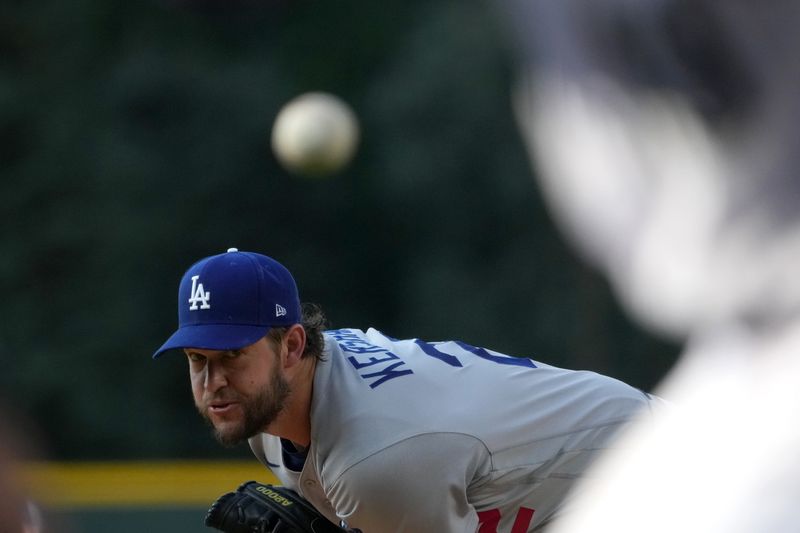 Jul 30, 2022; Denver, Colorado, USA; Los Angeles Dodgers starting pitcher Clayton Kershaw (22) delivers a pitch in the first inning against the Colorado Rockies at Coors Field. Mandatory Credit: Ron Chenoy-USA TODAY Sports