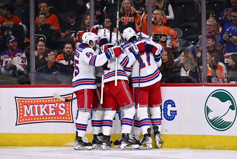 Nov 24, 2023; Philadelphia, Pennsylvania, USA; New York Rangers center Mika Zibanejad (93) celebrates with teammates after scoring a goal against the Philadelphia Flyers in the first period at Wells Fargo Center. Mandatory Credit: Kyle Ross-USA TODAY Sports