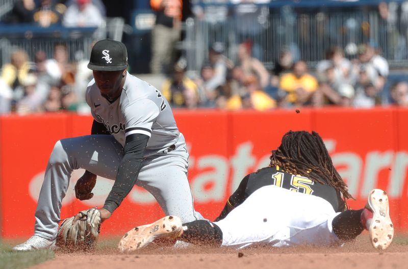 Apr 9, 2023; Pittsburgh, Pennsylvania, USA;  Pittsburgh Pirates shortstop Oneil Cruz (15) steals second base as Chicago White Sox shortstop Tim Anderson (7) takes a late throw during the sixth inning at PNC Park. Mandatory Credit: Charles LeClaire-USA TODAY Sports