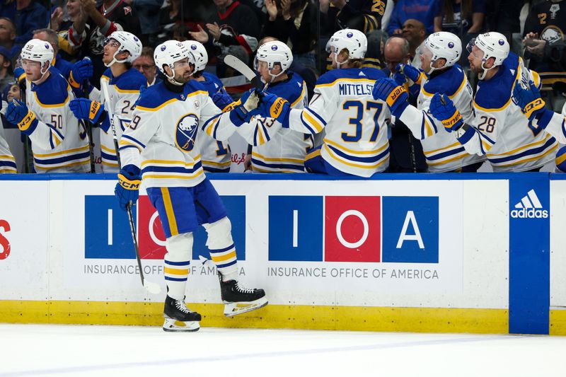 Feb 29, 2024; Tampa, Florida, USA;  Buffalo Sabres right wing Alex Tuch (89) is congratulated after scoring a goal against the Tampa Bay Lightning in the first period at Amalie Arena. Mandatory Credit: Nathan Ray Seebeck-USA TODAY Sports