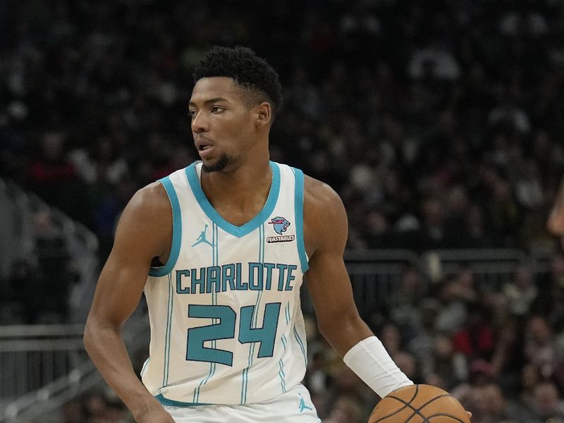 MILWAUKEE, WISCONSIN - FEBRUARY 27: Brandon Miller #24 of the Charlotte Hornets dribbles the ball during the first half against the Milwaukee Bucks at Fiserv Forum on February 27, 2024 in Milwaukee, Wisconsin. NOTE TO USER: User expressly acknowledges and agrees that, by downloading and or using this photograph, User is consenting to the terms and conditions of the Getty Images License Agreement. (Photo by Patrick McDermott/Getty Images)