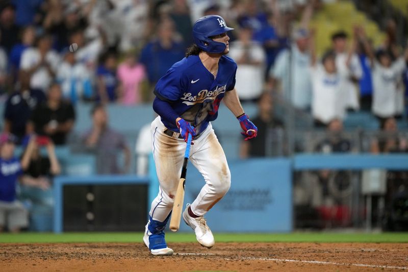 Jul 25, 2023; Los Angeles, California, USA; Los Angeles Dodgers center fielder James Outman (33) follows through on a walk-off double in the 10th inning against the Toronto Blue Jays at Dodger Stadium. Mandatory Credit: Kirby Lee-USA TODAY Sports