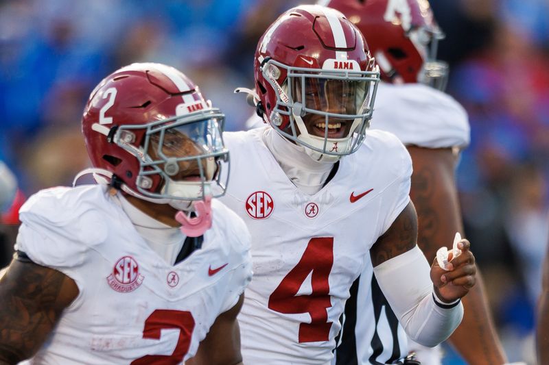 Nov 11, 2023; Lexington, Kentucky, USA; Alabama Crimson Tide quarterback Jalen Milroe (4) smiles as he runs back to the sideline during the third quarter against the Kentucky Wildcats at Kroger Field. Mandatory Credit: Jordan Prather-USA TODAY Sports