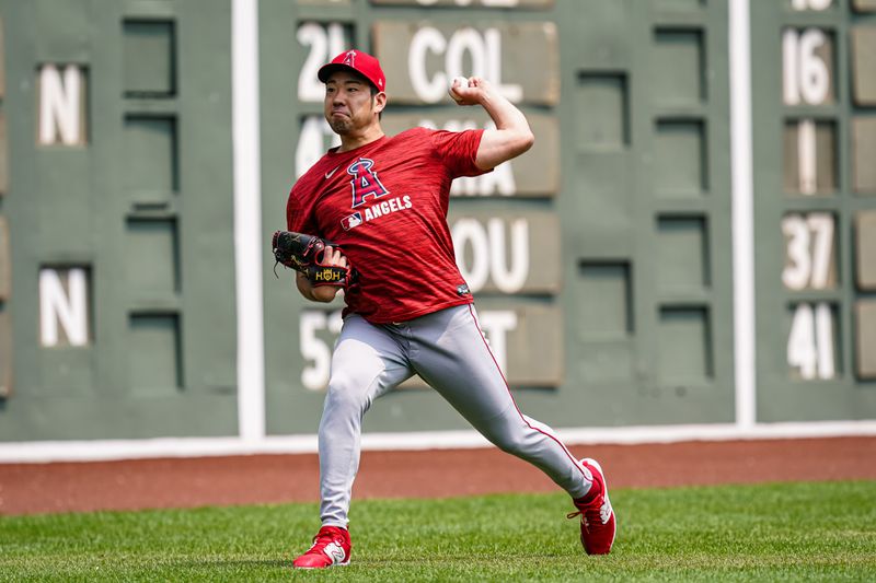 Jun 4, 2025; Boston, Massachusetts, USA; Los Angeles Angels pitcher Yusei Kikuchi (16) throws a few pitches before the start of the game against the Boston Red Sox at Fenway Park. Mandatory Credit: David Butler II-Imagn Images
