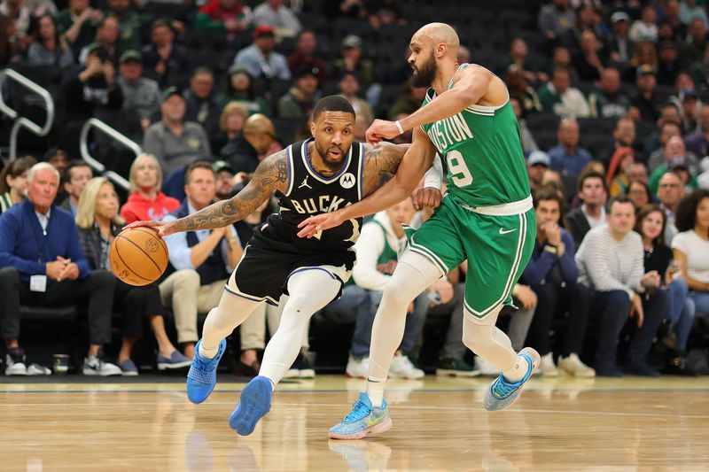 MILWAUKEE, WISCONSIN - APRIL 09: Damian Lillard #0 of the Milwaukee Bucks is defended by Derrick White #9 of the Boston Celtics during a game at Fiserv Forum on April 09, 2024 in Milwaukee, Wisconsin. NOTE TO USER: User expressly acknowledges and agrees that, by downloading and or using this photograph, User is consenting to the terms and conditions of the Getty Images License Agreement. (Photo by Stacy Revere/Getty Images)