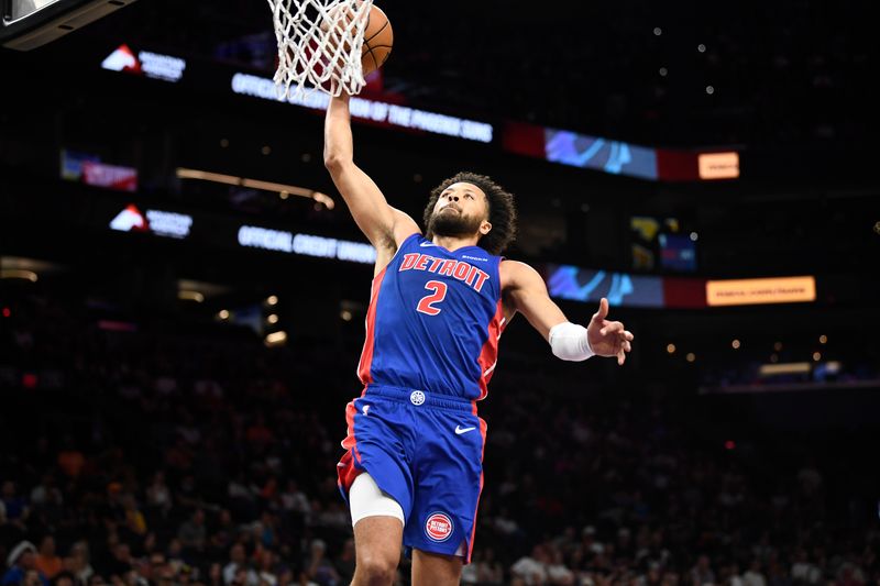 PHOENIX, ARIZONA - OCTOBER 11: Cade Cunningham #2 of the Detroit Pistons dunks against the Phoenix Suns during the first half of the preseason game at Footprint Center on October 11, 2024 in Phoenix, Arizona.  NOTE TO USER: User expressly acknowledges and agrees that, by downloading and/or using this photograph, user is consenting to the terms and conditions of the Getty Images License Agreement. (Photo by Kelsey Grant/Getty Images)