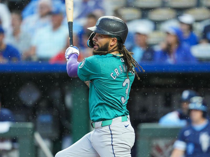 Jun 7, 2024; Kansas City, Missouri, USA; Seattle Mariners shortstop J.P. Crawford (3) hits a single during the fourth inning against the Kansas City Royals at Kauffman Stadium. Mandatory Credit: Jay Biggerstaff-USA TODAY Sports