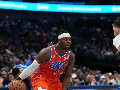 DALLAS, TX - DECEMBER 2: Luguentz Dort #5 of the Oklahoma City Thunder handles the ball during the game on December 2, 2023 at the American Airlines Center in Dallas, Texas. NOTE TO USER: User expressly acknowledges and agrees that, by downloading and or using this photograph, User is consenting to the terms and conditions of the Getty Images License Agreement. Mandatory Copyright Notice: Copyright 2023 NBAE (Photo by Glenn James/NBAE via Getty Images)