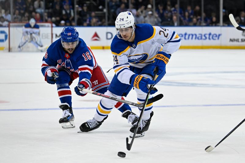 Nov 7, 2024; New York, New York, USA;  Buffalo Sabres center Dylan Cozens (24) skates with the puck chased by New York Rangers center Vincent Trocheck (16) during the first period at Madison Square Garden. Mandatory Credit: Dennis Schneidler-Imagn Images