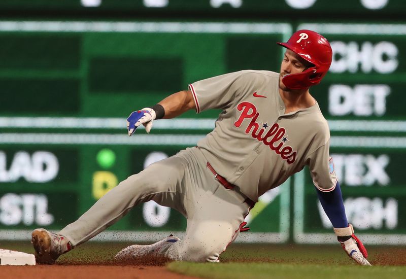 Jun 6, 2025; Pittsburgh, Pennsylvania, USA;  Philadelphia Phillies shortstop Trea Turner (7) arrives at second base with a double against the Pittsburgh Pirates during the third inning at PNC Park. Mandatory Credit: Charles LeClaire-Imagn Images
