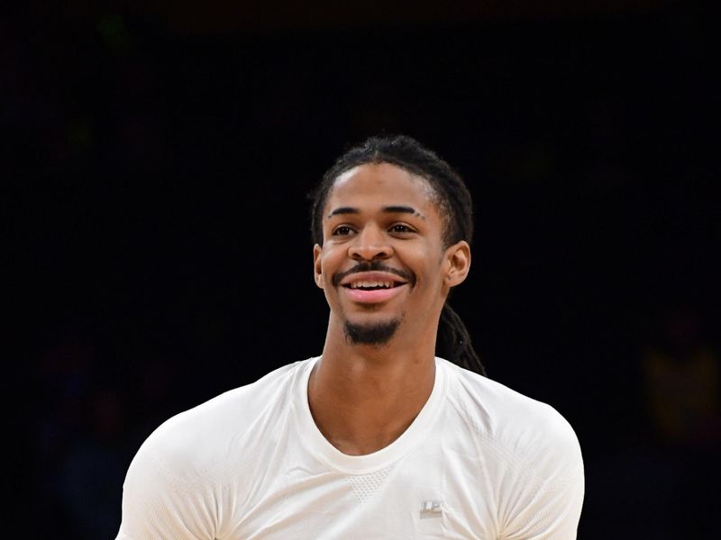 LOS ANGELES, CA - JANUARY 5: Ja Morant #12 of the Memphis Grizzlies smiles before the game against the Los Angeles Lakers on January 5, 2024 at Crypto.Com Arena in Los Angeles, California. NOTE TO USER: User expressly acknowledges and agrees that, by downloading and/or using this Photograph, user is consenting to the terms and conditions of the Getty Images License Agreement. Mandatory Copyright Notice: Copyright 2024 NBAE (Photo by Adam Pantozzi/NBAE via Getty Images)