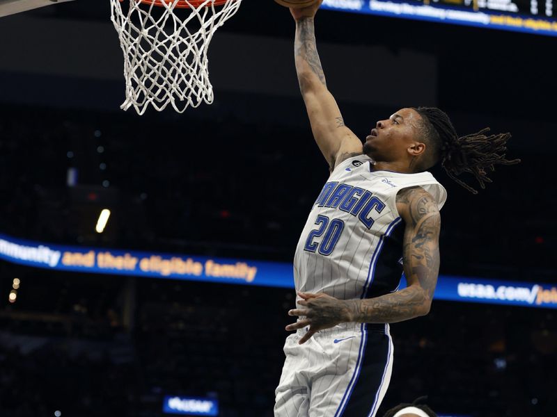 SAN ANTONIO, TX - MARCH 14:  Markelle Fultz #20 of the Orlando Magic scores against the San Antonio Spurs in the second half at AT&T Center on March 14, 2023 in San Antonio, Texas. NOTE TO USER: User expressly acknowledges and agrees that, by downloading and or using this photograph, User is consenting to terms and conditions of the Getty Images License Agreement. (Photo by Ronald Cortes/Getty Images)