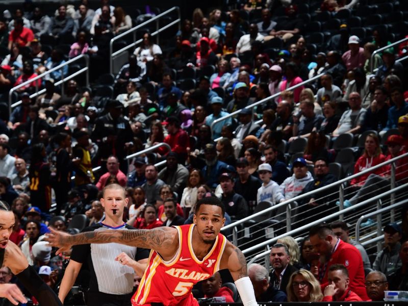 ATLANTA, GA - FEBRUARY 10: Dejounte Murray #5 of the Atlanta Hawks dribbles the ball during the game against the Houston Rockets on February 10, 2024 at State Farm Arena in Atlanta, Georgia.  NOTE TO USER: User expressly acknowledges and agrees that, by downloading and/or using this Photograph, user is consenting to the terms and conditions of the Getty Images License Agreement. Mandatory Copyright Notice: Copyright 2024 NBAE (Photo by Scott Cunningham/NBAE via Getty Images)