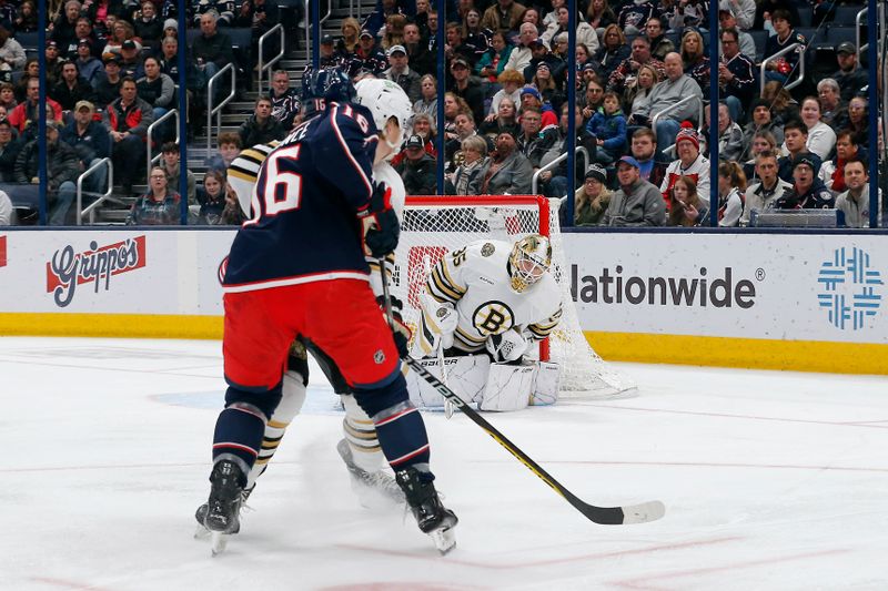 Jan 2, 2024; Columbus, Ohio, USA; Boston Bruins goalie Linus Ullmark (35) makes a save on the shot from Columbus Blue Jackets center Brendan Gaunce (16) during the first period at Nationwide Arena. Mandatory Credit: Russell LaBounty-USA TODAY Sports