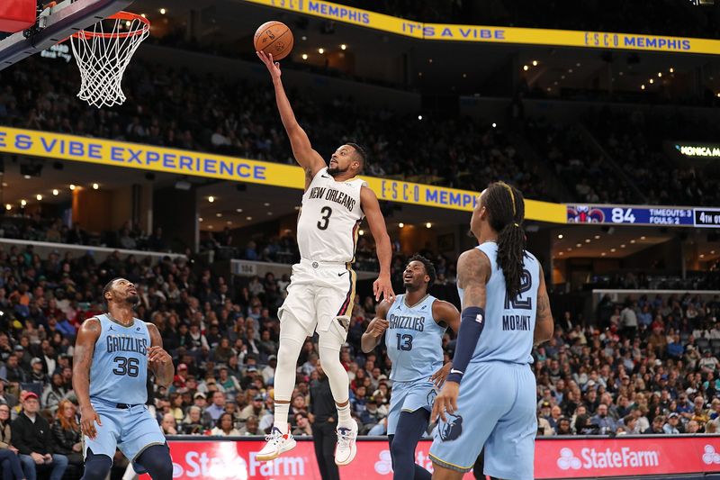 MEMPHIS, TENNESSEE - NOVEMBER 29: CJ McCollum #3 of the New Orleans Pelicans goes to the basket during the second half against the Memphis Grizzlies of an Emirates NBA Cup game at FedExForum on November 29, 2024 in Memphis, Tennessee. NOTE TO USER: User expressly acknowledges and agrees that, by downloading and or using this photograph, User is consenting to the terms and conditions of the Getty Images License Agreement. (Photo by Justin Ford/Getty Images)