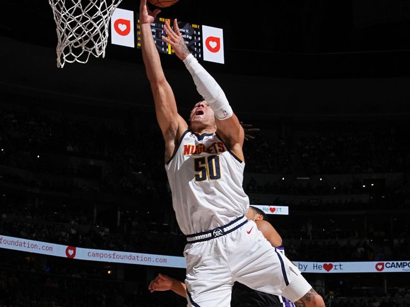 DENVER, CO - FEBRUARY 28: Aaron Gordon #50 of the Denver Nuggets drives to the basket during the game against the Sacramento Kings on February 28, 2024 at the Ball Arena in Denver, Colorado. NOTE TO USER: User expressly acknowledges and agrees that, by downloading and/or using this Photograph, user is consenting to the terms and conditions of the Getty Images License Agreement. Mandatory Copyright Notice: Copyright 2024 NBAE (Photo by Garrett Ellwood/NBAE via Getty Images)