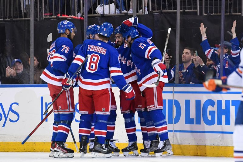 Dec 22, 2023; New York, New York, USA;  New York Rangers right wing Blake Wheeler (17) celebrates his goal against the Edmonton Oilers during the first period at Madison Square Garden. Mandatory Credit: Dennis Schneidler-USA TODAY Sports