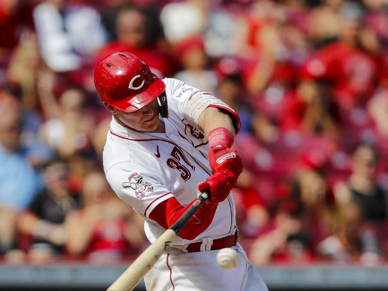 Aug 6, 2023; Cincinnati, Ohio, USA; Cincinnati Reds catcher Tyler Stephenson (37) hits a single against the Washington Nationals in the ninth inning at Great American Ball Park. Mandatory Credit: Katie Stratman-USA TODAY Sports