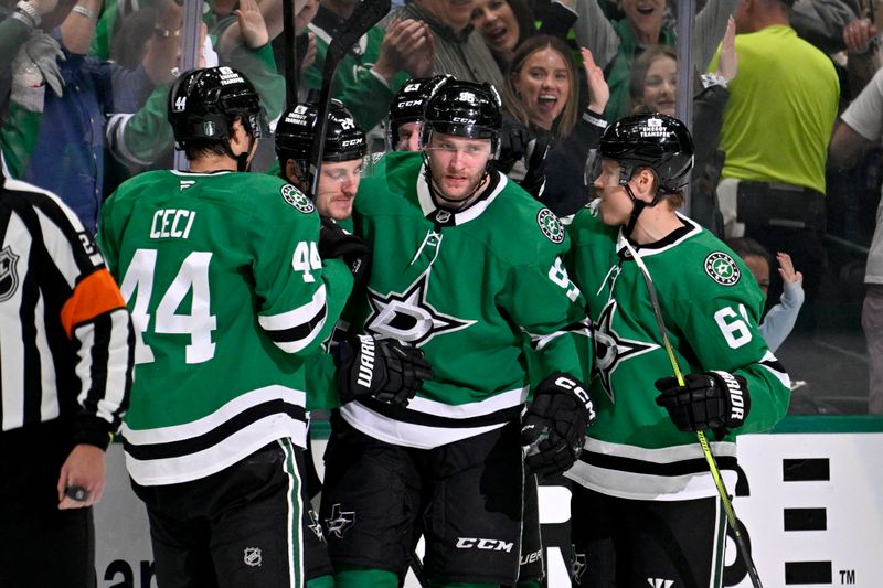 May 11, 2025; Dallas, Texas, USA; Dallas Stars right wing Mikko Rantanen (96) and defenseman Cody Ceci (44) and center Roope Hintz (24) and center Mikael Granlund (64) celebrates a goal scored by Granlund against the Winnipeg Jets during the third period in game three of the second round of the 2025 Stanley Cup Playoffs at American Airlines Center. Mandatory Credit: Jerome Miron-Imagn Images