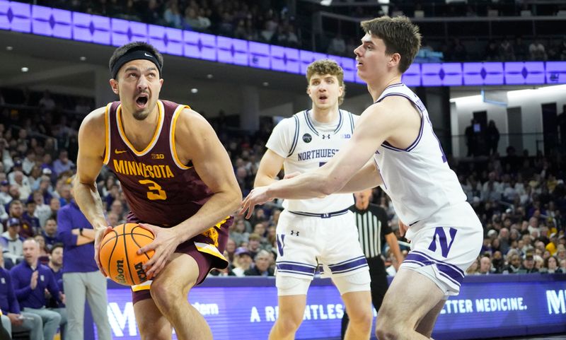 Mar 9, 2024; Evanston, Illinois, USA; Northwestern Wildcats guard Brooks Barnhizer (13) defends Minnesota Golden Gophers forward Dawson Garcia (3) during the first half at Welsh-Ryan Arena. Mandatory Credit: David Banks-USA TODAY Sports